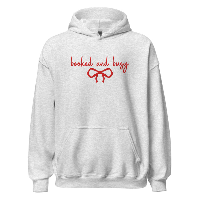 Booked and Busy Embroidered Hoodie - The Bean Workshop - Balletcore, Coquette Aesthetic, Embroidered Bow, Embroidered Bow Hoodie for Book Lovers, Embroidered Hoodie, Feminine Holiday Reader Gift, Fleece Pullover, Holiday Hoodie, Minimalist, Minimalist Coquette Christmas Pullover, Premium Gifting, Red Bow, Winter Loungewear