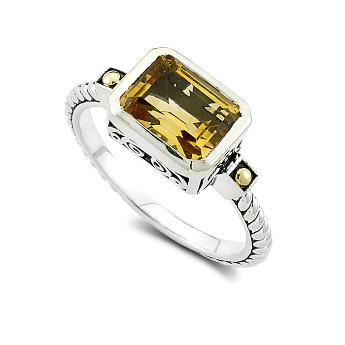 Samuel B Eirini Emerald Cut Citrine Ring, Size 7. Our Sterling Silver and 18k yellow gold ring with emerald cut citrine is handcrafted in Bali by our skilled artisans. From our signature collection, Royal Bali™ featuring designs handcrafted using sterling silver, solid 18k gold accents and genuine gemstones.