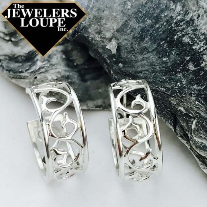 Southern Gates Scroll Hoop Earrings Classic Series 20mm diameter, 9mm wide 925 Sterling Silver Designed in Charleston, SC An original design from the Southern Gates® Collection inspired by traditional filigree patterns found in historic wrought iron gates throughout the South.