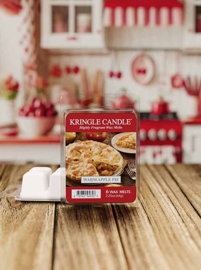 Kringle Candle wax melts packaging on a wooden surface with a kitchen background