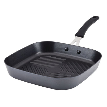 11-Inch Cook + Create Hard Anodized Nonstick Deep Grill Pan, crafted from durable hard-anodized aluminum, includes a scratch-resistant surface and boasts a sleek black handle.