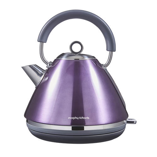 Purple electric kettle with a gray handle on a white background