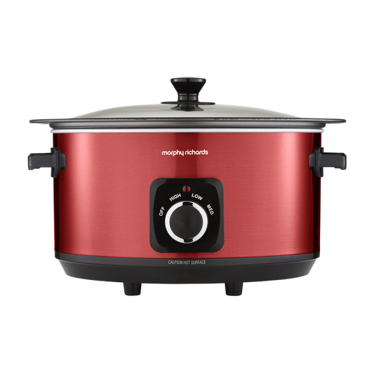 Red slow cooker with black control panel on a white background