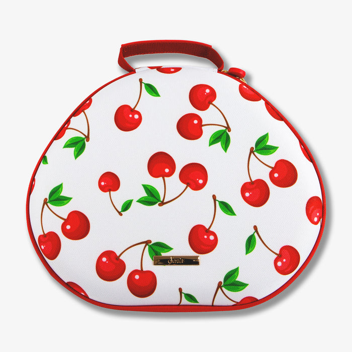 Close-up top view of AirPods Max carrying case showing cherry print, red trim, and fabric handle on white background