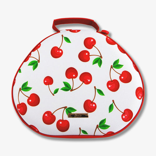 Close-up top view of AirPods Max carrying case showing cherry print, red trim, and fabric handle on white background