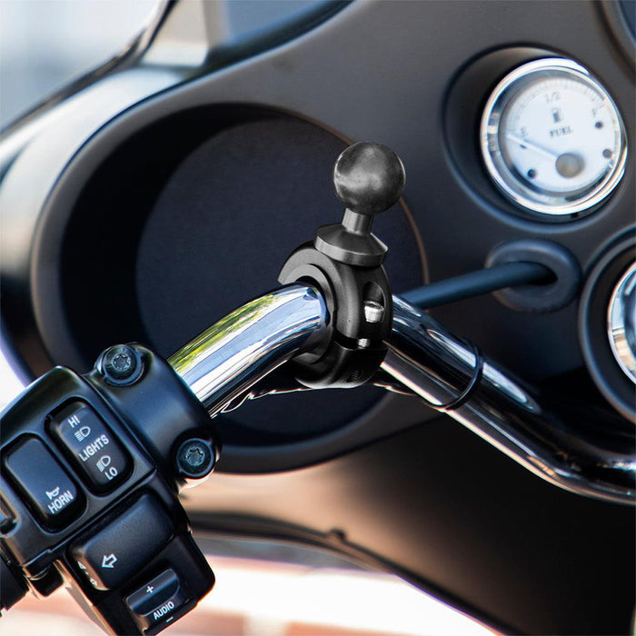 Close-up of a motorcycle handlebar showing the Aluminum Motorcycle Handlebar Mount - 25mm (1 inch) Compatible, with dashboard gauges and control buttons on the left handle.