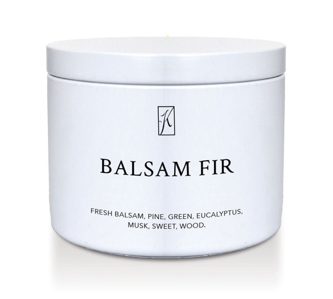 White candle jar labeled 'Balsam Fir' with a logo on a white background
