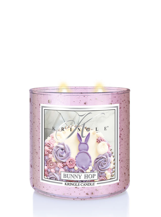Kringle Candle Bunny Hop candle with decorative design on a white background