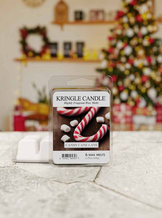 Kringle Candle wax melts packaging with Christmas decorations in the background