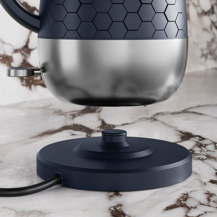 Blue Kettle hovering above Hot plate.