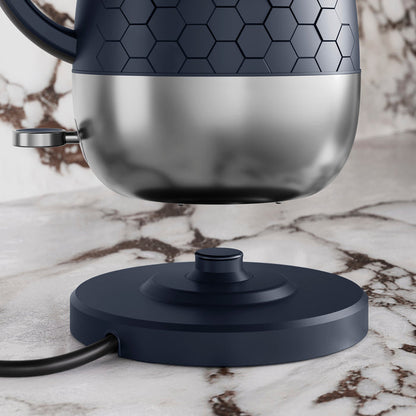 Blue Kettle hovering above Hot plate.