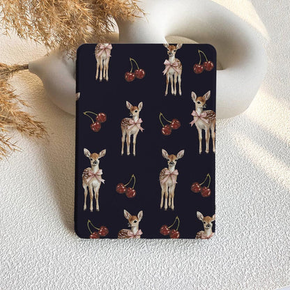 Card with deer and cherry pattern on a textured surface