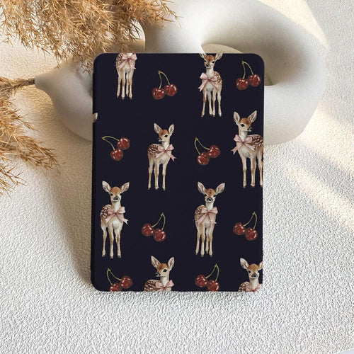 Card with deer and cherry pattern on a textured surface