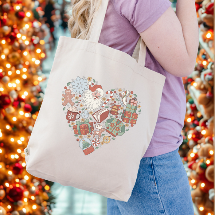 Christmas Necessities Organic Cotton Twill Tote Bag - The Bean Workshop - Book Lover Gift, Bookworm, Canvas Tote, Christmas Gift, Christmas Necessities Tote Bag, Festive Accessory, Groovy Christmas, Heart Design, Holiday Shopping Bag, Library Bag, Retro Holiday Tote for Readers, Santa Claus, Vintage Christmas Collage Bag