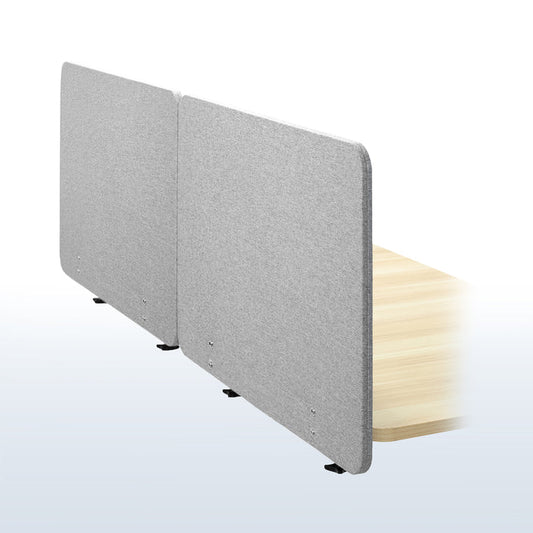 Clamp-on desk privacy panel for office workspace.