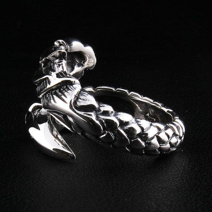A .925 sterling silver dragon armor ring with a brilliant, high-polish finish and dark, oxidized details.