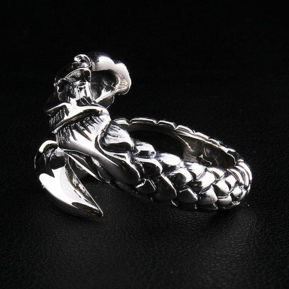 A .925 sterling silver dragon armor ring with a brilliant, high-polish finish and dark, oxidized details.