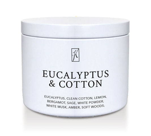 Jar of candle with 'Eucalyptus & Cotton' fragrance on a white background