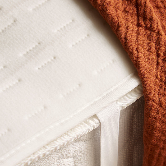 electric heat pad on bed