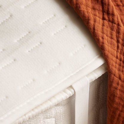 electric heat pad on bed
