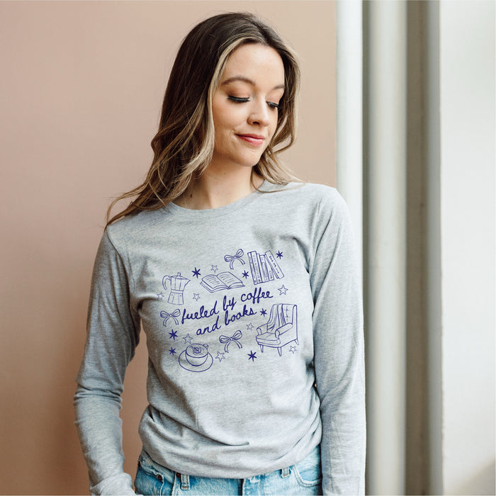 Fueled by Coffee and Books Long Sleeve Tee - The Bean Workshop - Bookaholic, Bookish tee shirt, Bows, Coffee Lover Gift, Coquette Aesthetic, Cozy Reading, Cozy Valentine's Gift for Bookworm, Doodle Art, Fueled by Coffee and Books Long sleeve tee, Loungewear, Reader Gift, Reading Crewneck, Spring and Fall Wear