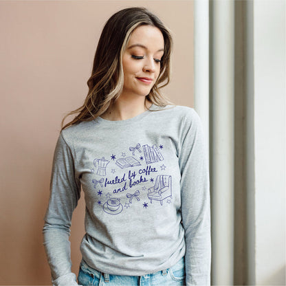 Fueled by Coffee and Books Long Sleeve Tee - The Bean Workshop - Bookaholic, Bookish tee shirt, Bows, Coffee Lover Gift, Coquette Aesthetic, Cozy Reading, Cozy Valentine's Gift for Bookworm, Doodle Art, Fueled by Coffee and Books Long sleeve tee, Loungewear, Reader Gift, Reading Crewneck, Spring and Fall Wear