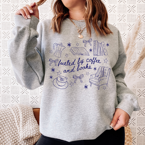Fueled by Coffee and Books Sweatshirt - The Bean Workshop - Bookaholic, Bookish Sweatshirt, Bows, Coffee Lover Gift, Coquette Aesthetic, Cozy Reading, Cozy Valentine's Gift for Bookworm, Doodle Art, Fueled by Coffee and Books Sweatshirt, Loungewear, Reader Gift, Reading Crewneck, sweatshirt, Winter Wear