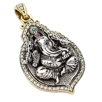 Angled view of the Ganesh sterling silver pendant showing the halo of clear stones and gold bail.
