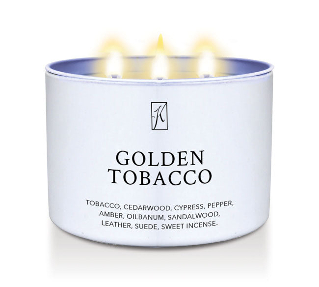 Candle in a white container labeled 'Golden Tobacco' with a logo on a white background
