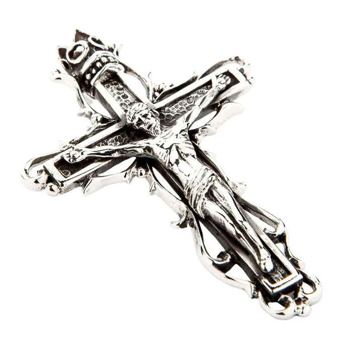 Close-up detail of gothic 925 sterling silver crucifix pendant showing thorny vine motifs and crown design