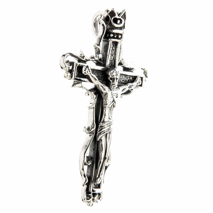 Side profile view of solid 925 sterling silver gothic crucifix pendant showing dimensional depth and craftsmanship