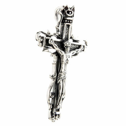 Side profile view of solid 925 sterling silver gothic crucifix pendant showing dimensional depth and craftsmanship