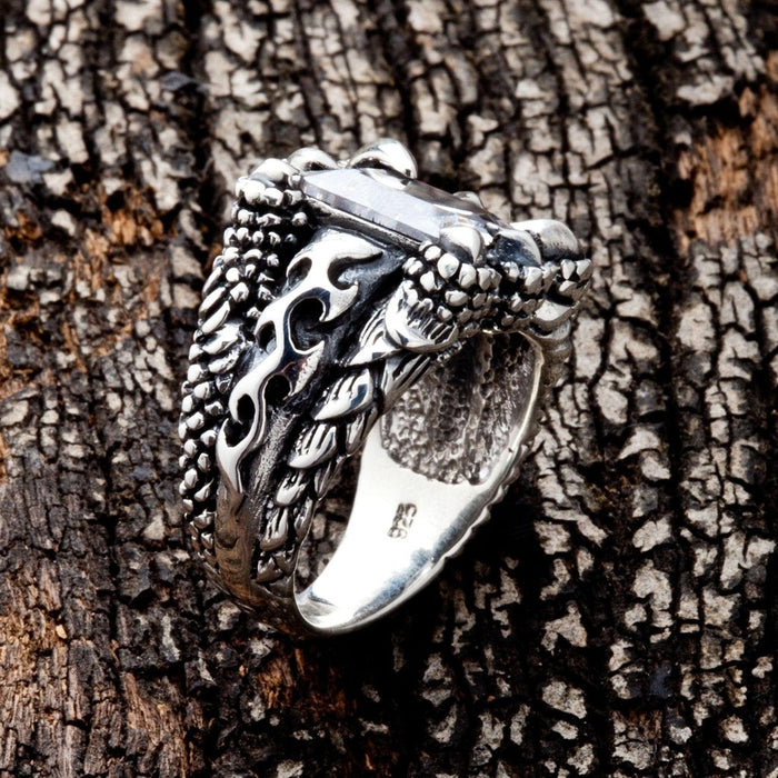 Profile view displaying the thick shank and gothic flame motifs
