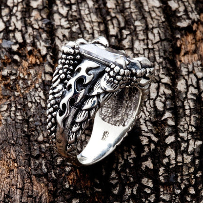 Profile view displaying the thick shank and gothic flame motifs