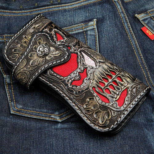 Front view of hand-carved leather biker wallet featuring skull and red stingray inlay