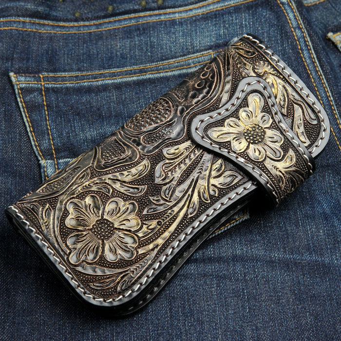 Back of wallet showing intricate floral hand-carved leather details