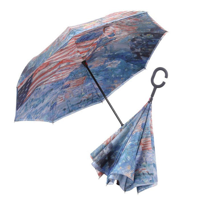 Inverted umbrella with a colorful design on a white background