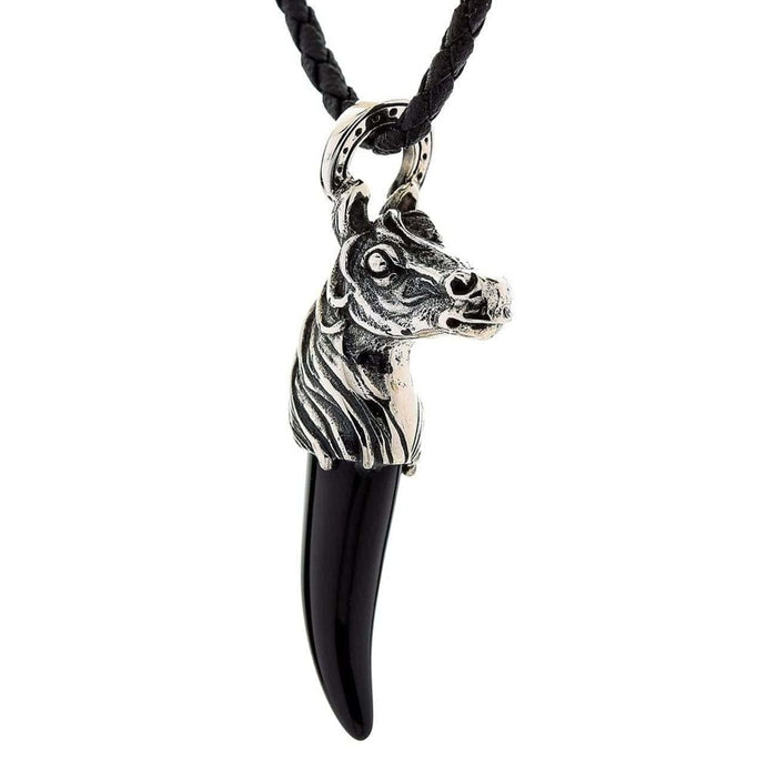 Equestrian sterling silver pendant featuring detailed horse head and black onyx fang angled view