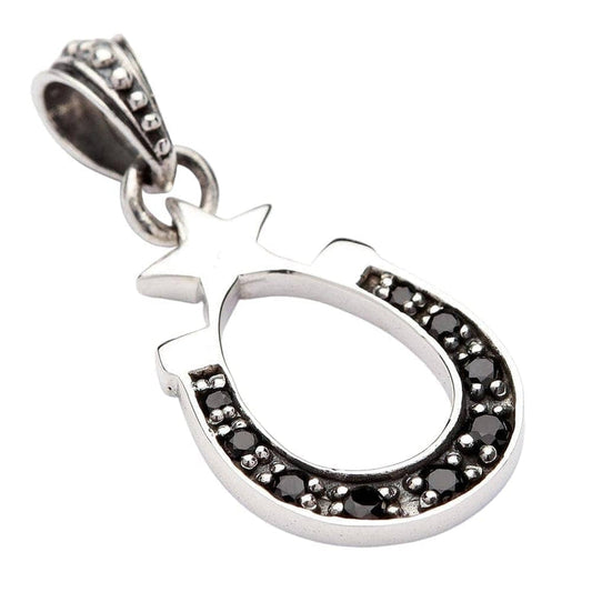 An angled view of the horseshoe and star pendant, highlighting its polished sterling silver finish.