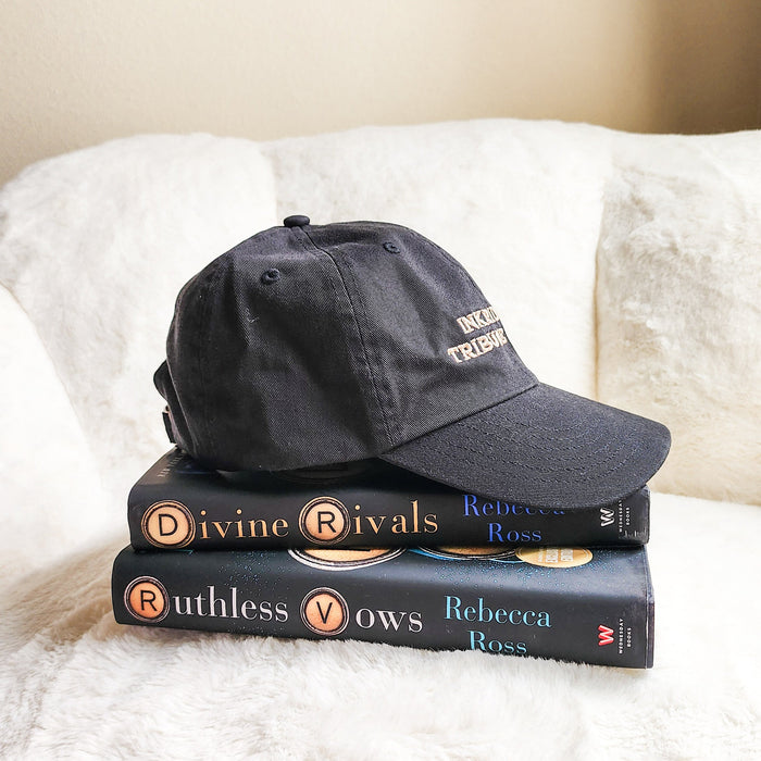 Inkridden Tribune Press War Correspondent Embroidered Bio-Washed Dad Hat - The Bean Workshop - cozy gift, Divine Rivals, divine rivals embroidered hat, hat, Inkridden Tribune, Inkridden Tribune apparel for readers, inkridden tribune press hat for readers, Rebecca Ross, Rebecca Ross book merch, Rebecca Ross fan merchandise
