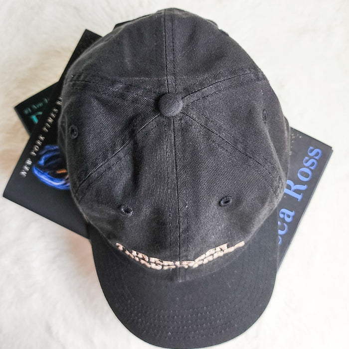 Inkridden Tribune Press War Correspondent Embroidered Bio-Washed Dad Hat - The Bean Workshop - cozy gift, Divine Rivals, divine rivals embroidered hat, hat, Inkridden Tribune, Inkridden Tribune apparel for readers, inkridden tribune press hat for readers, Rebecca Ross, Rebecca Ross book merch, Rebecca Ross fan merchandise