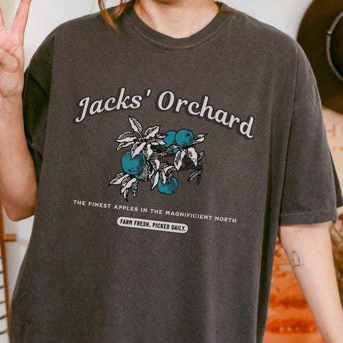 Jacks' Orchard Tee Shirt - The Bean Workshop - Blue Apple Design, Casual Wear, Cotton Graphic Tee, evangeline fox, Fandom Apparel, Jacks Fan T-Shirt, jacks prince of hearts, once upon a broken heart, ouabh, Prince of Hearts, retro, Retro Typography, stephanie garber, Summer Bookish Fashion, t-shirt, The Magnificent North, Vintage Farm Aesthetic