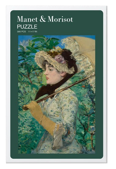 Jigsaw puzzle with a woman holding a parasol, inspired by Manet & Morisot, with packaging on the side.