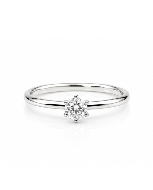 Silverring med 0,5 ct diamant infattad i krona. Förlovningsring till dam