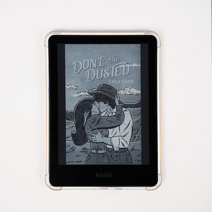 Kindle device with a book cover displayed on the screen against a white background