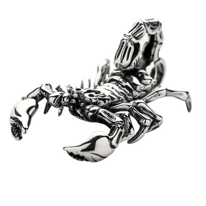 A realistic, three-dimensional sterling silver scorpion pendant showcasing the detailed segments of its exoskeleton and tail.