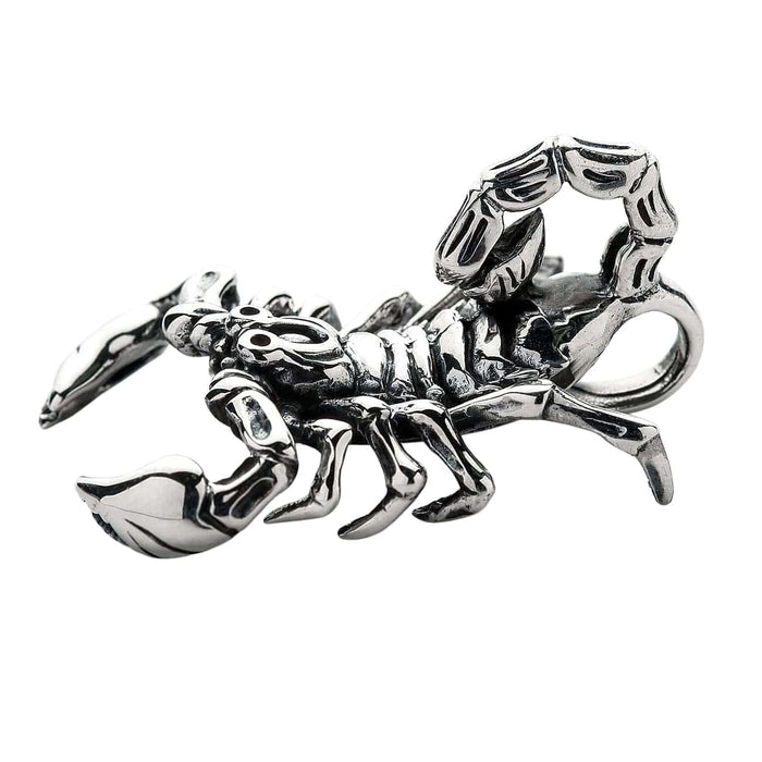 A classic piece of gothic biker jewelry: a solid silver pendant intricately sculpted into a menacing scorpion.