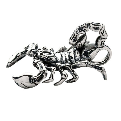 A classic piece of gothic biker jewelry: a solid silver pendant intricately sculpted into a menacing scorpion.