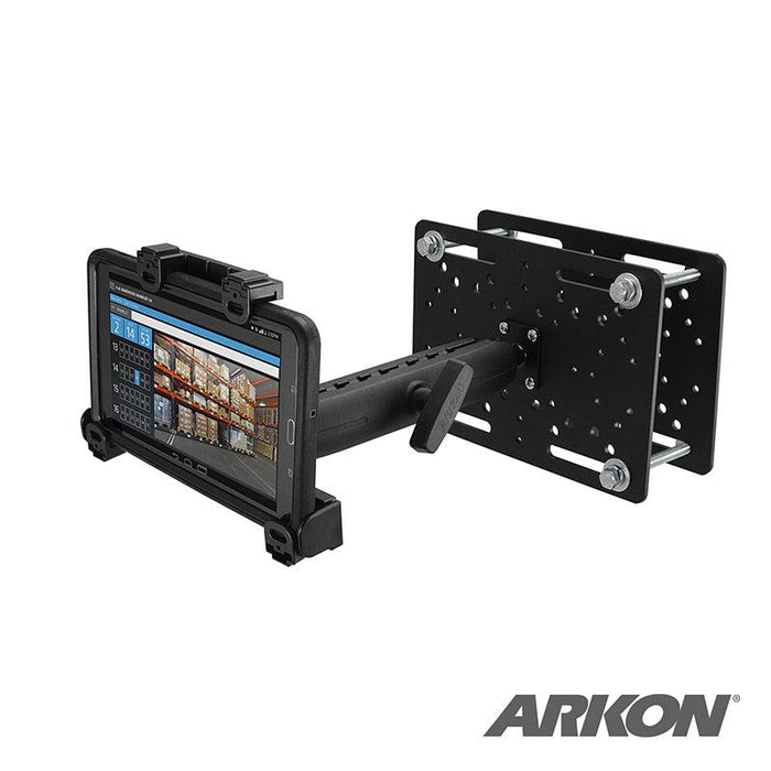 The LockVise™ Locking Forklift Overhead Guard Tablet Mount with 8.5 Metal Shaft is shown on a black metal bracket with wall plate, displaying a warehouse inventory screen—ideal for secure warehouse or forklift tablet mounting.