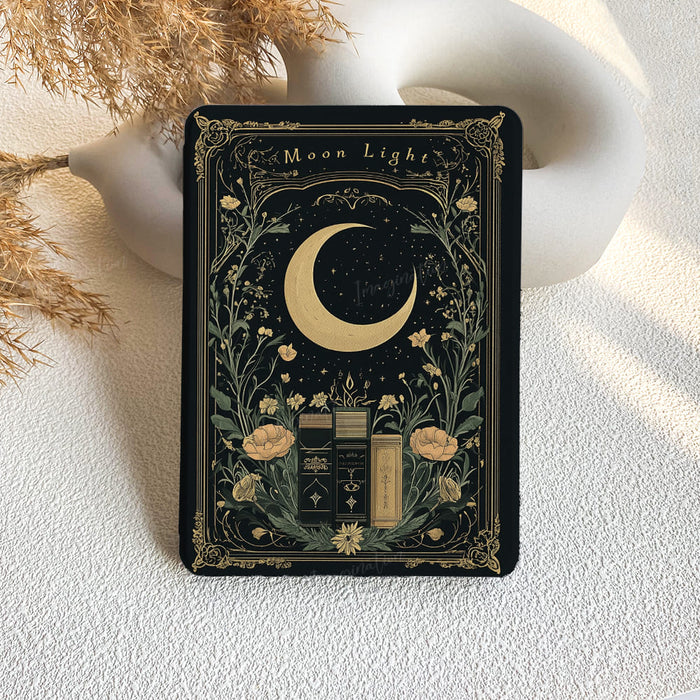 Decorative card with moon and candle design on a textured surface